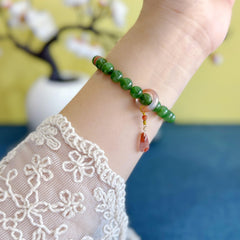 Natural Jasper Designer Bracelet with Nanhong, featuring an Original New Chinese-Style Running Ring and Subtle Black Specks.